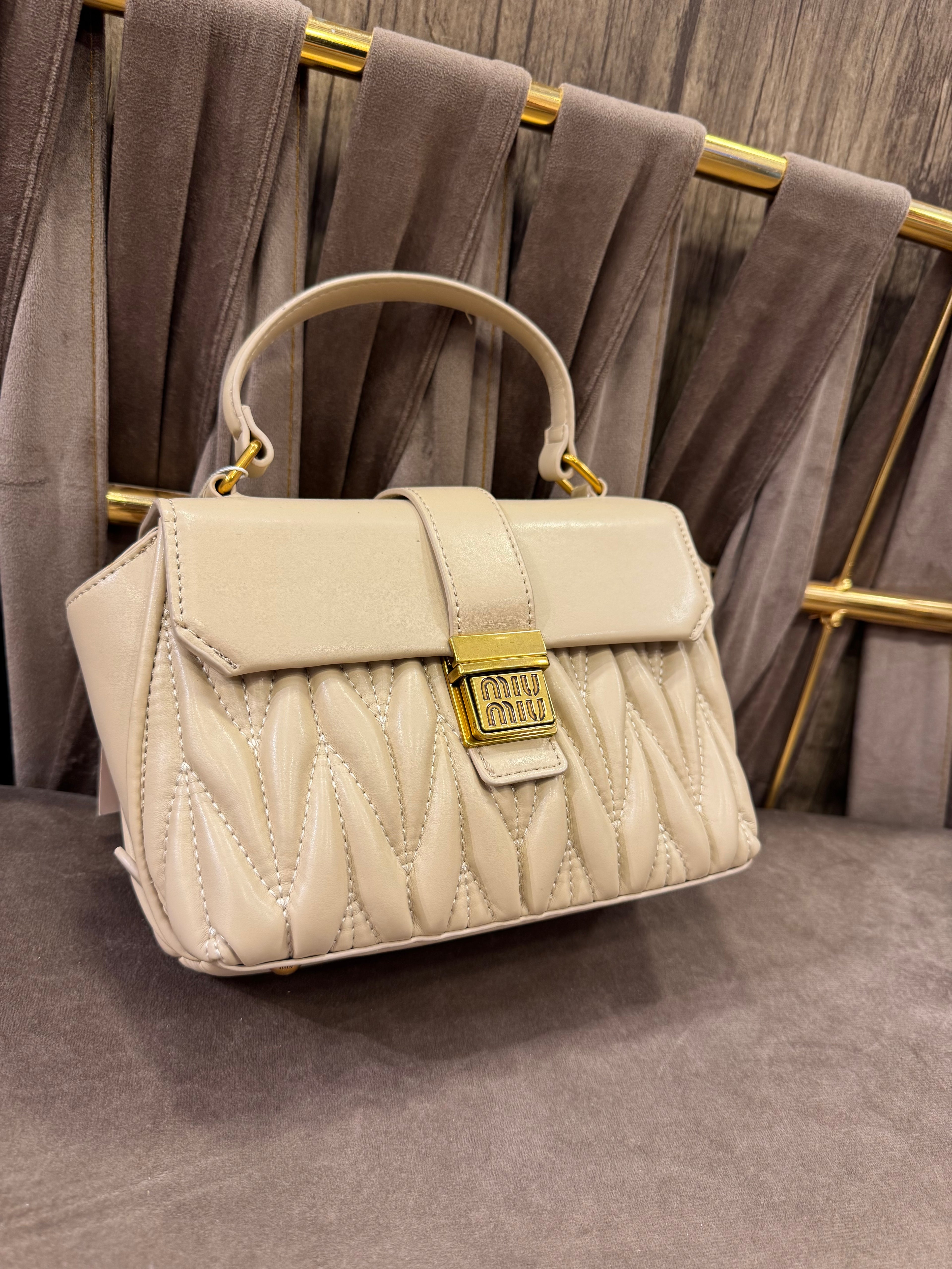 Miu Miu matelassé leather mini bag